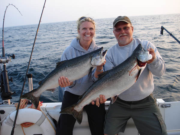 Nicki and Bob with Kings - Leprechaun Fishing Charters on Lake Michigan