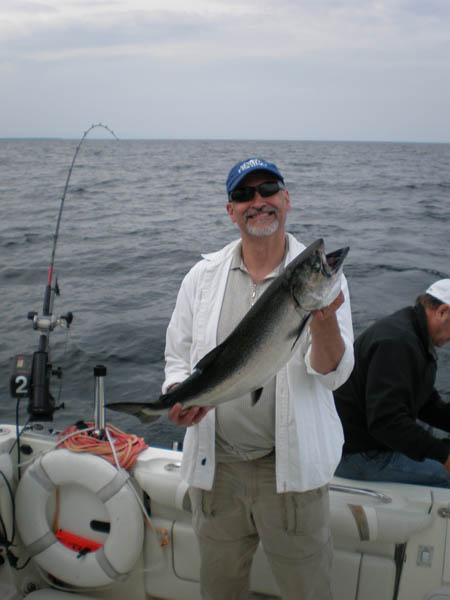 Alan with  King Salmon- Leprechaun Fishing Charters on Lake Michigan
