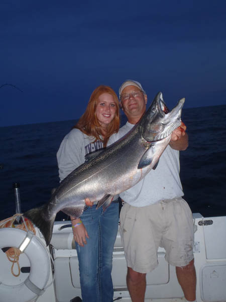 Kelsy Foat with big King Salmon  - Leprechaun Fishing Charters on Lake Michigan